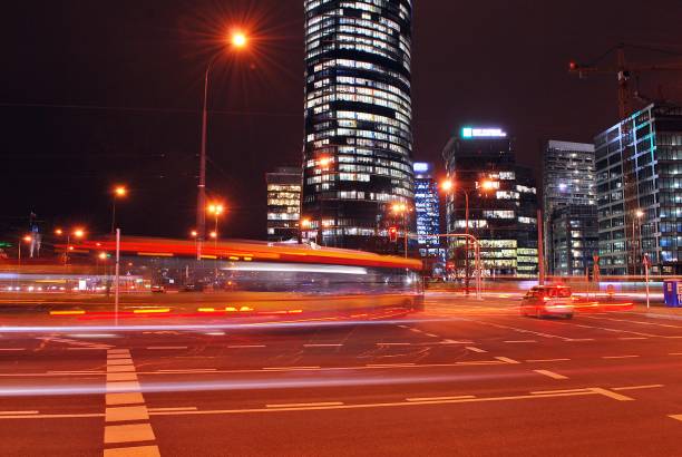 istock The light trails on the modern building background 688724434