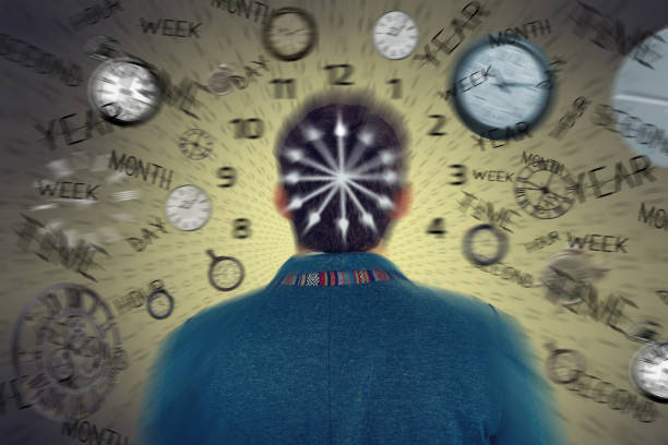 Businessman turned to camera. Rear back view of business man standing in front of passing time.Fast time concept. Race with time.Too little time.