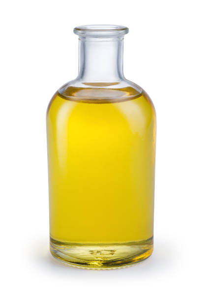 istock Oil in glass bottle isolated on white background. With clipping path. 688739044