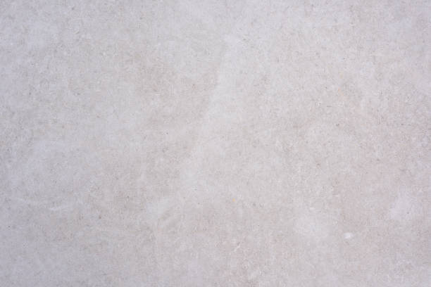 istock Background of light grey concrete cement ground surface. 688745692