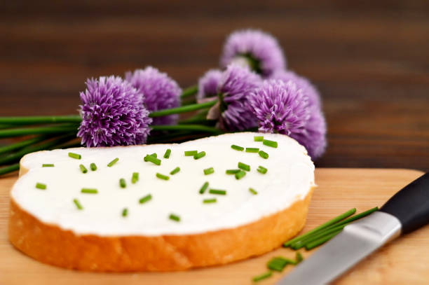 Cottage cheese and chives on the bread slice