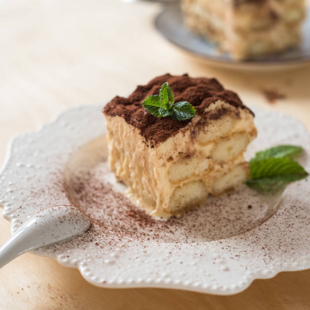 istock homemade tiramisu cake on wood background 688764800