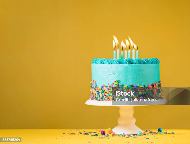 Blue Birthday Cake On Yellow Stock Photo - Download Image Now - Birthday, Birthday Cake, Cake