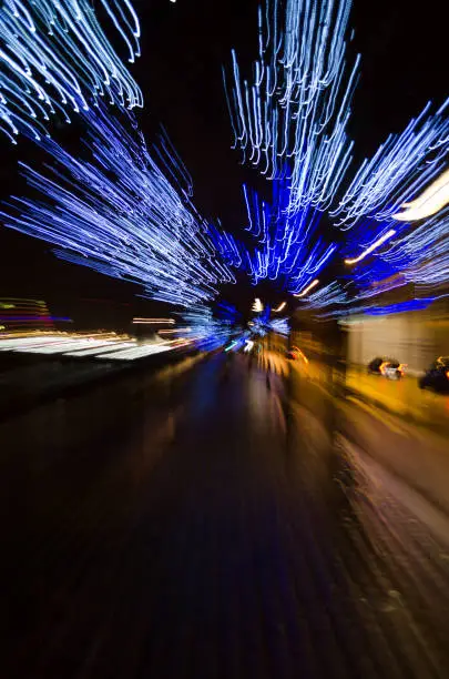 Motion-blur photograph of city street lights at night