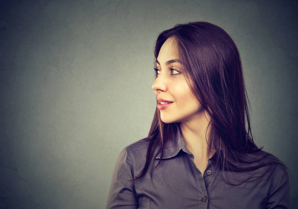 istock side profile of beautiful woman 688776678