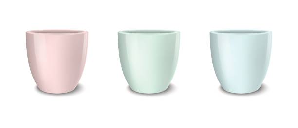 istock Realistic vector empty flower pot set, pastel colors - pink, green and blue. Closeup isolated on white background. Design template for branding, mockup. EPS10 688790300