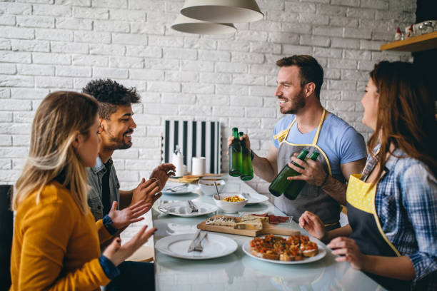 istock Friends partying at home 688790418