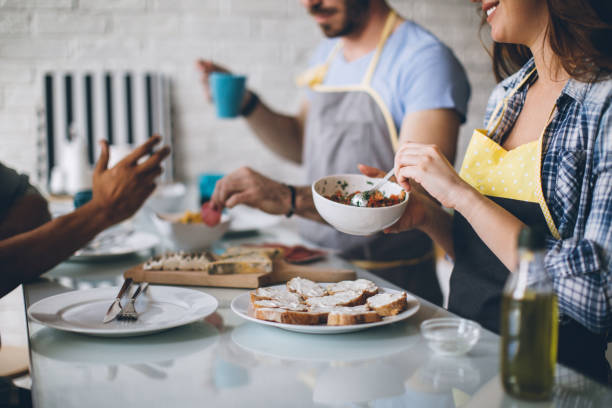 istock Couple preparing food for their friends 688790680