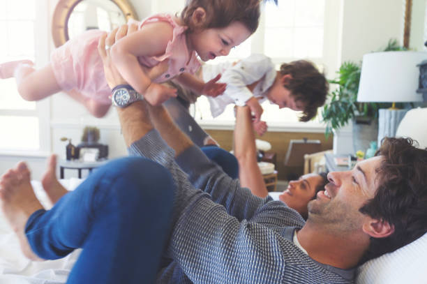 istock Family playing on the bed. 688796718