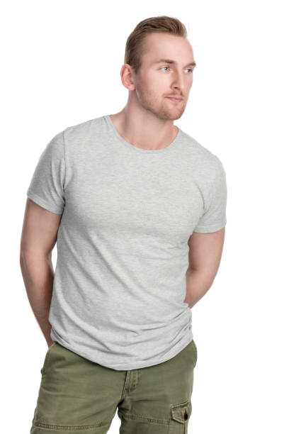 istock Focused blonde male standing in studio 688797680