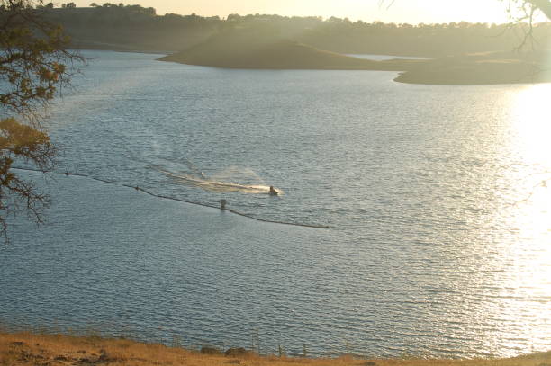 istock Jetski on the lake at sunset 688797716