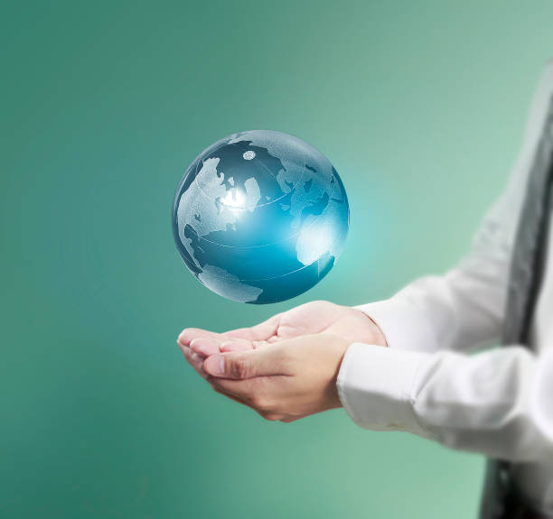 istock lobe ,earth in human hand, Earth image provided by Nasa 688809572