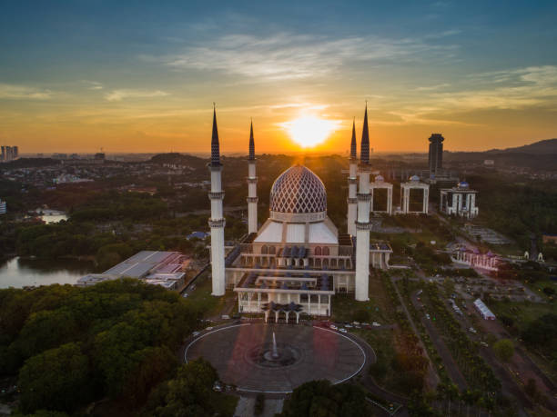 istock Masjid (Mosque) Sultan Salahuddin Abdul Aziz Shah from aerial view during sunset. 688815754