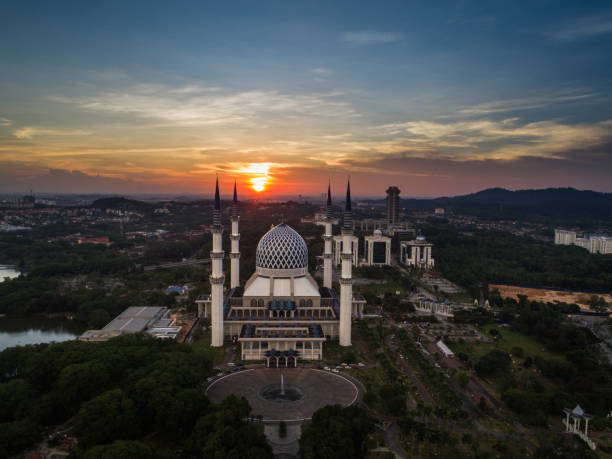 istock Masjid (Mosque) Sultan Salahuddin Abdul Aziz Shah from aerial view during sunset. 688815766