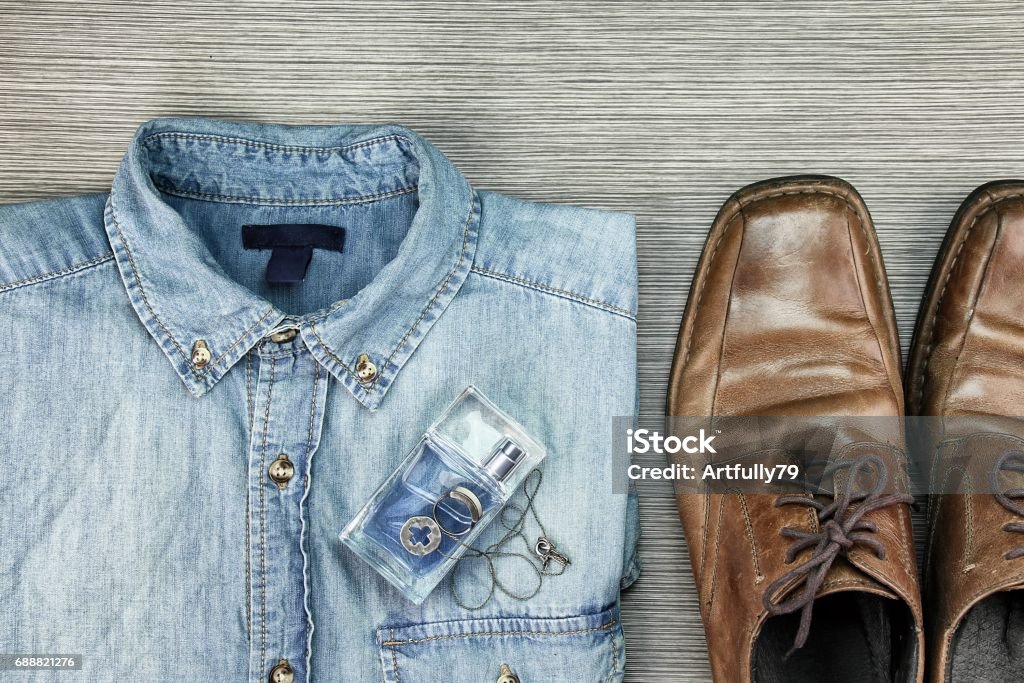 Passed grandmother Settle Men Fashion Smart And Casual Outfits Blue Jeans Shirt Leather Shoes Perfume  Necklaces Ring Stock Photo - Download Image Now - iStock