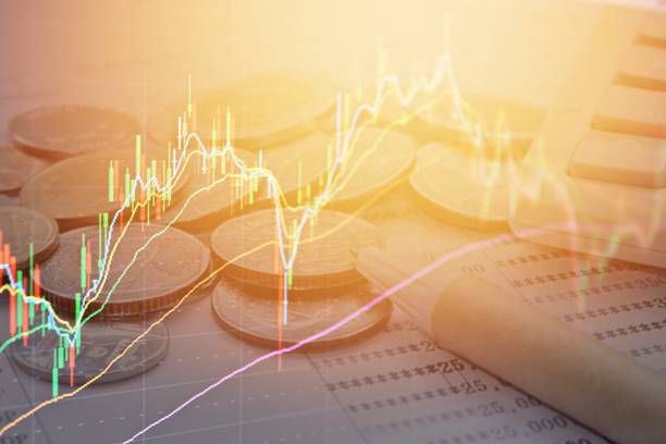 istock Double exposure of stock exchange graph chart and coins, pen, calculator, saving account passbook 688828238