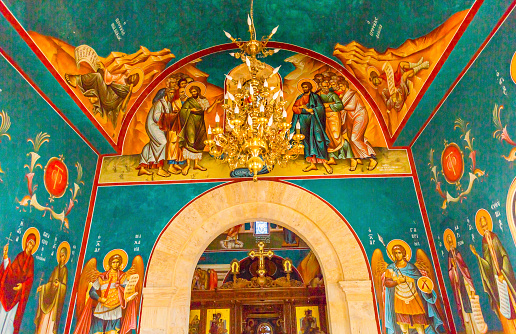 Frescoes Chandelier John Baptist Greek Orthodox Church Jesus Baptism Site John Baptist Bethany Beyond Jordan.  Actual baptism site of Jesus.  Jordan River Moved and Ruins are of Byzantine Churches marking spot of baptism.  Rediscovered late 1990s and early 2000.  Church opened 2011 on Old Church site