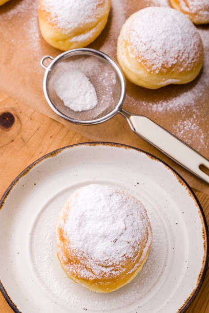 istock homemade donut with powder sugar 688889544