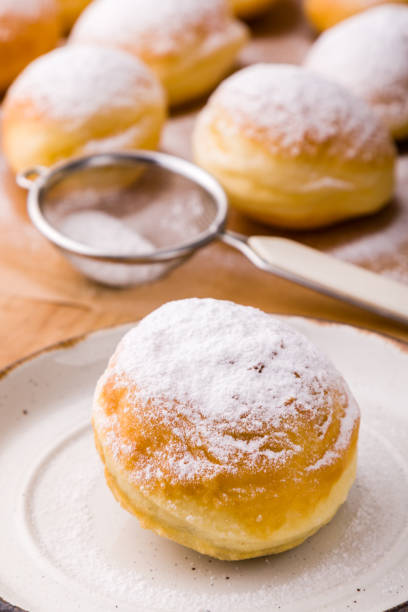 istock homemade donut with powder sugar 688889578