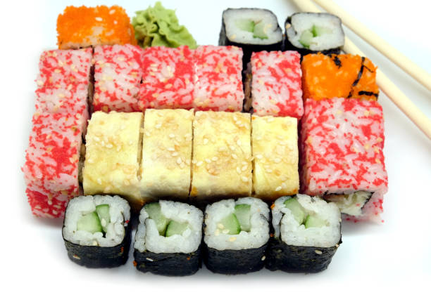 istock Sushi on white plate on white background closeup 688899886