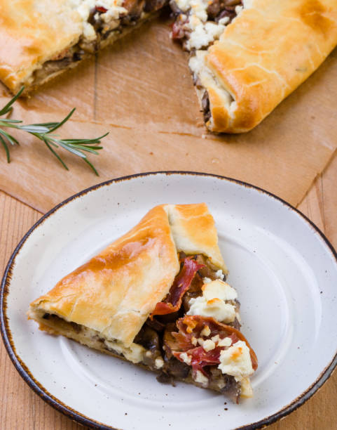 istock galette with mushrooms, bacon and cheese 688900516