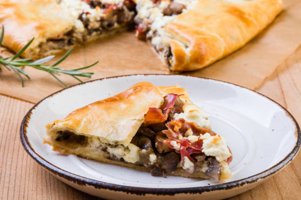 istock galette with mushrooms, bacon and cheese 688900518