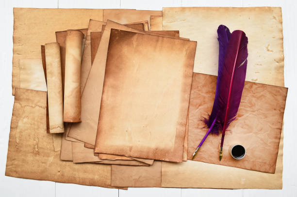 istock old paper with feather and ink 688914494
