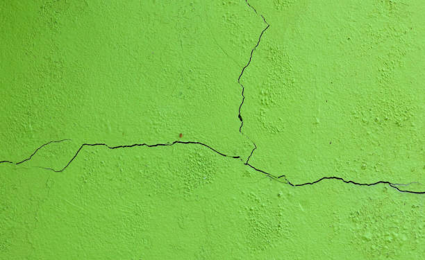 istock Grunge concrete cement wall with crack in industrial 688915250