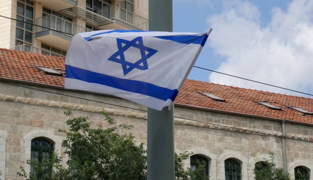 istock Israeli Flag, Jerusalem, Handheld shot 688934350