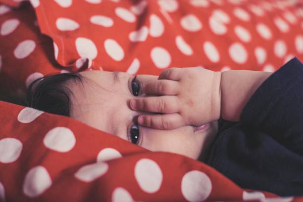 istock Child sucking thumb on finger 688934556