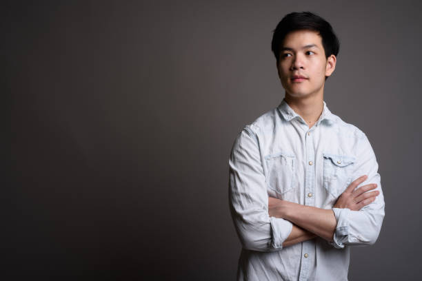 istock Portrait of handsome young Asian man 688941278