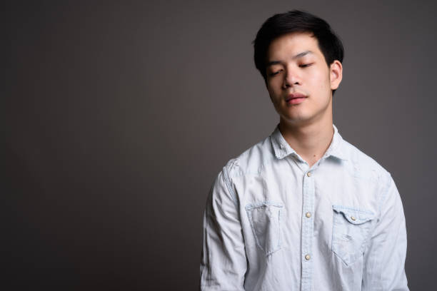 istock Portrait of handsome young Asian man 688941322
