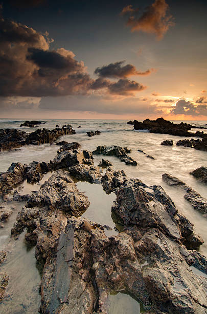 istock Rocks In Calm Sea 688948819