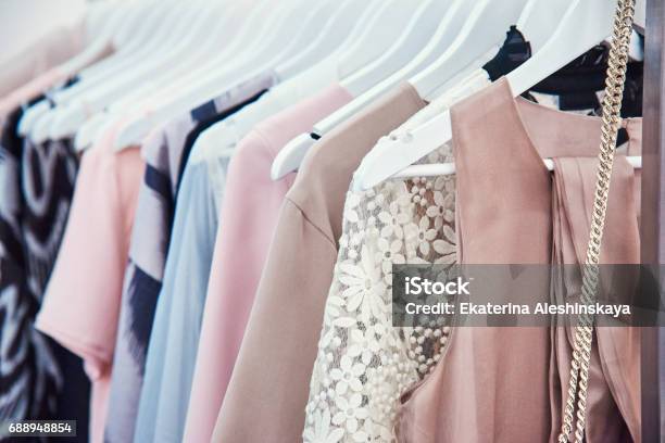 Details Of Bright Beautiful Pastel Tones Dress Collection In Show Room Stock Photo - Download Image Now