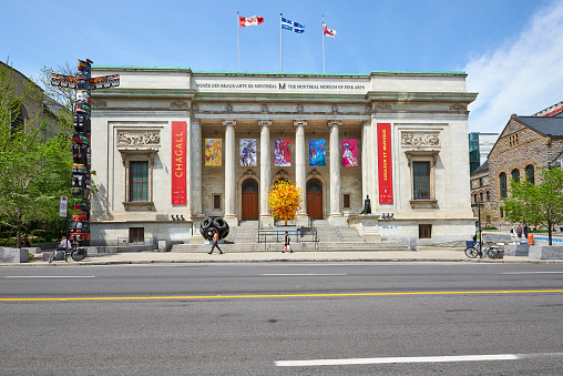 Montreal, Quebec, Canada - 18 May 2017: Sherbrooke Street West with the Facade of the Montreal Museum of Fine Art.