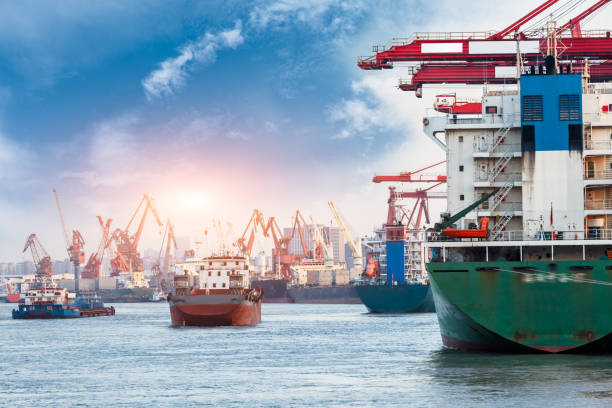 istock Containers loading by crane in the morning,trade port,shipping 688973322