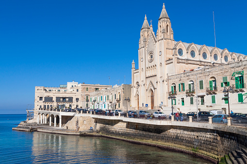 ST JULIANS, MALTA - APRIL 13, 2014: Our Lady of Mount Carmel Church on Balluta Bay in St. Julian's, Malta on April 13, 2014.