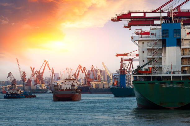 istock Containers loading by crane in the morning,trade port,shipping 688976466