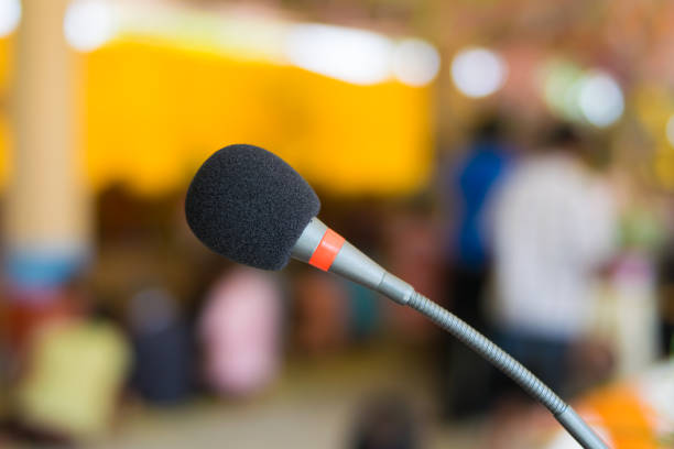 istock black microphone in meeting room 688984654