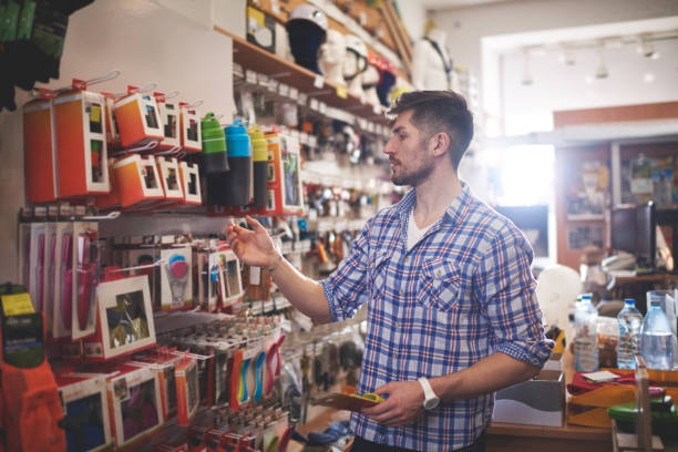 istock Man in sports store 688996996
