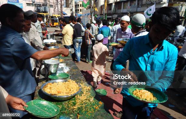 Indian Muslims Distribute The Public Food A Ritual On Milad Un Nabi Birthday Of Prophet Mohammed Hyderabad India Stock Photo - Download Image Now