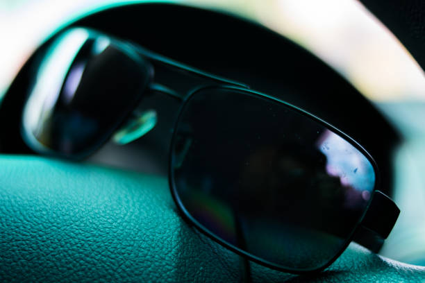 istock black eyeglasses on the car 689004132