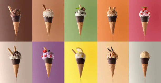 Assortment of natural fruit ice cream isolated with representative color background in a pattern. Front view