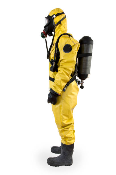 istock Worker in a protective suit and breathing apparatus isolated 689004828