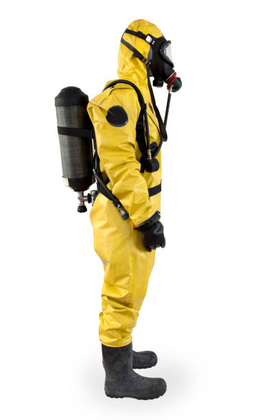 istock Worker in a protective suit and breathing apparatus isolated 689004846