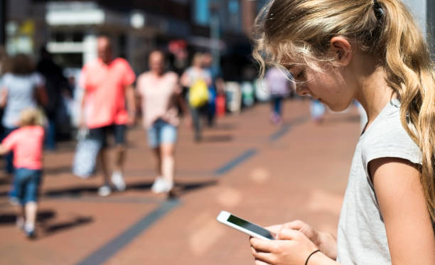 istock Young girl using smartphone 689008160