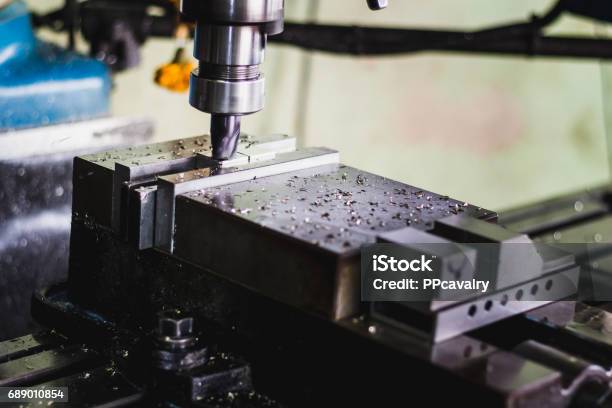 Active Milling Machine During Processing Part Of Engine Stock Photo - Download Image Now