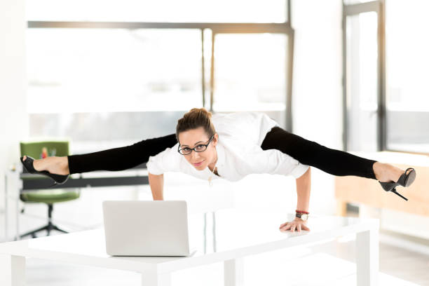 istock Happy female athlete working in office 689022782