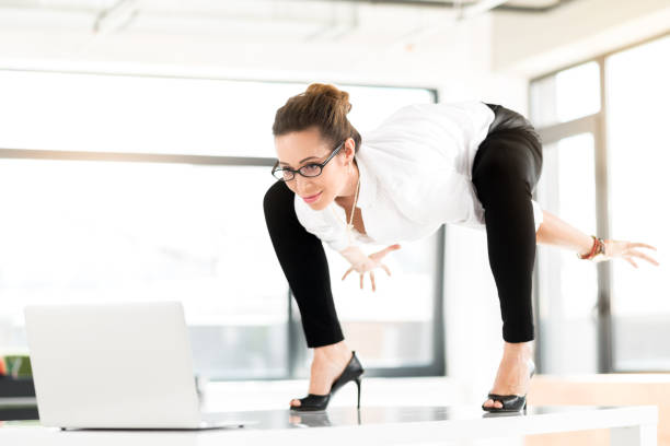 istock Smiling woman working in office 689022954