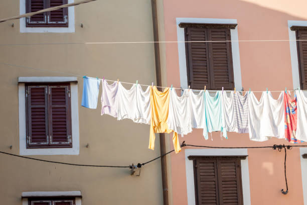 istock laundry drying outside in the town 689026774